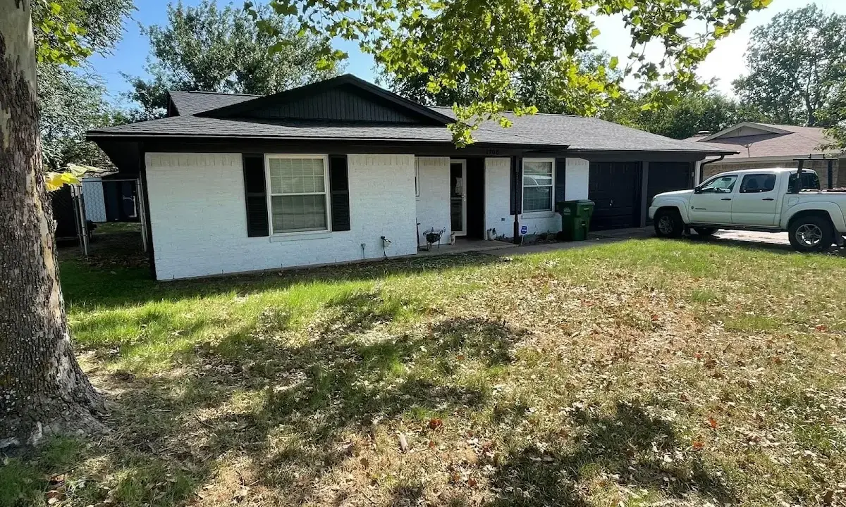 Professional roofing crew working on a residential roof in Reynoldsburg